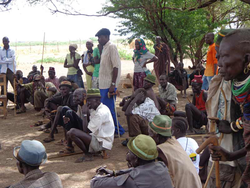 Community members from Nadapal village in Kakuma discuss on planned drilling of wells.: Photograph © UNESCO/Nairobi Office